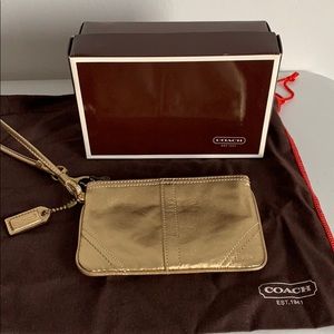 Coach gold wristlet